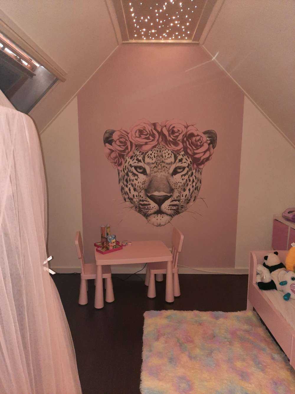 Leopard with pink flowers