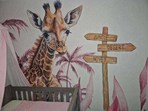 Baby giraffe in the jungle pink