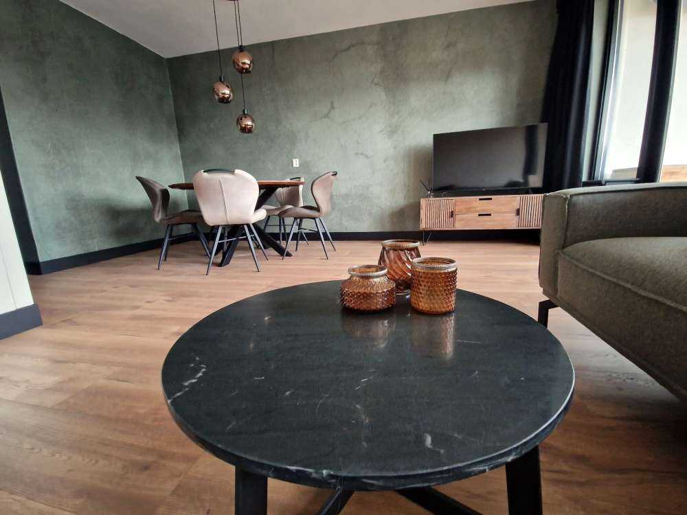 Green concrete with sweeping cracks