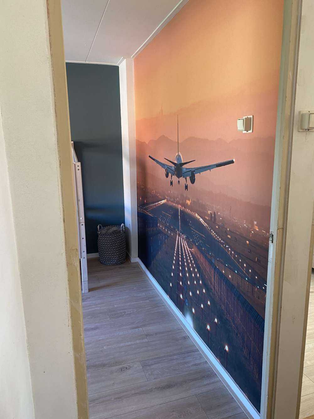 Landing plane in the evening sun