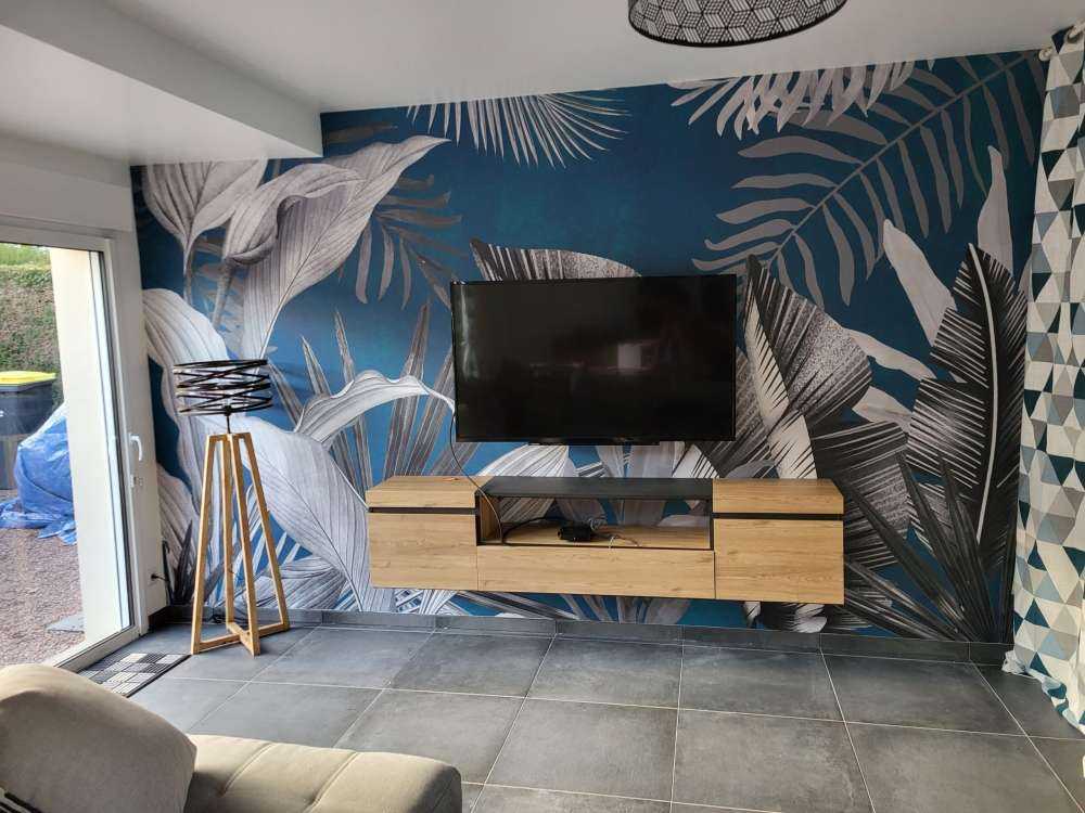 Tropical leaves on a blue background