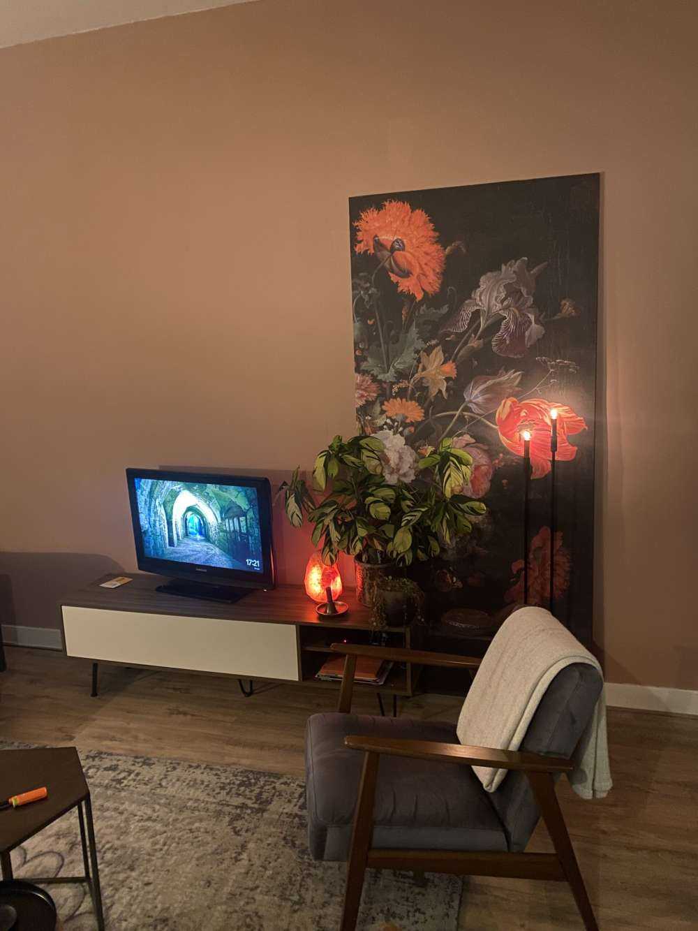 Still life with flowers and a watch