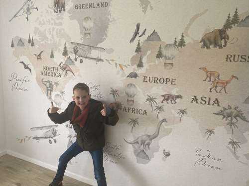 World map with dinosaurs