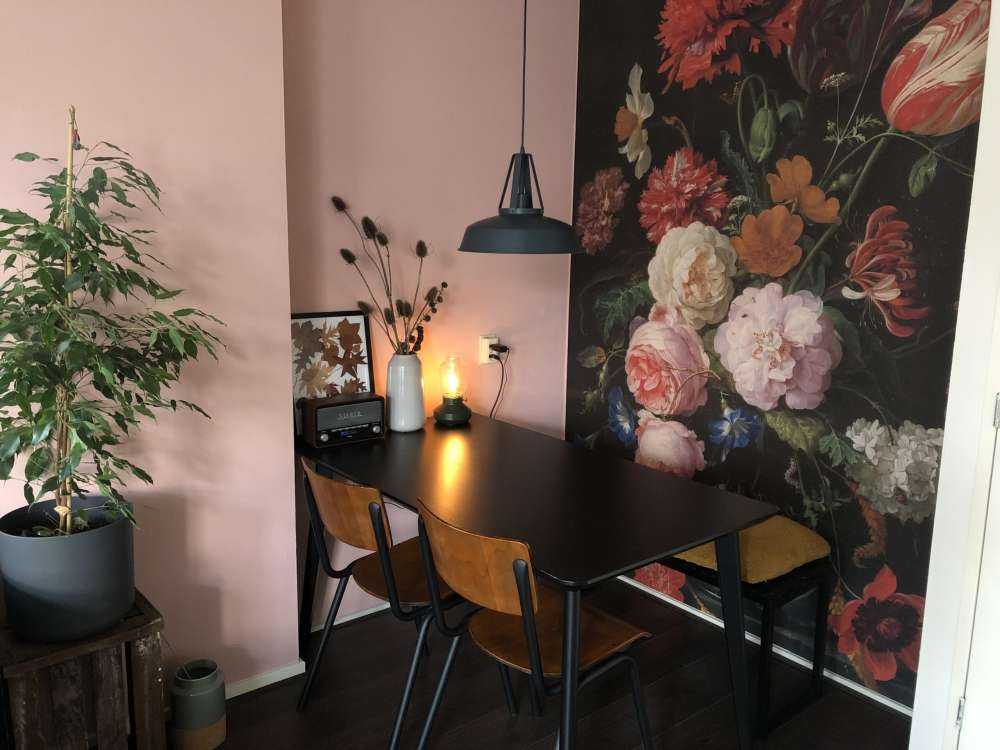 Still life with flowers in a glass vase