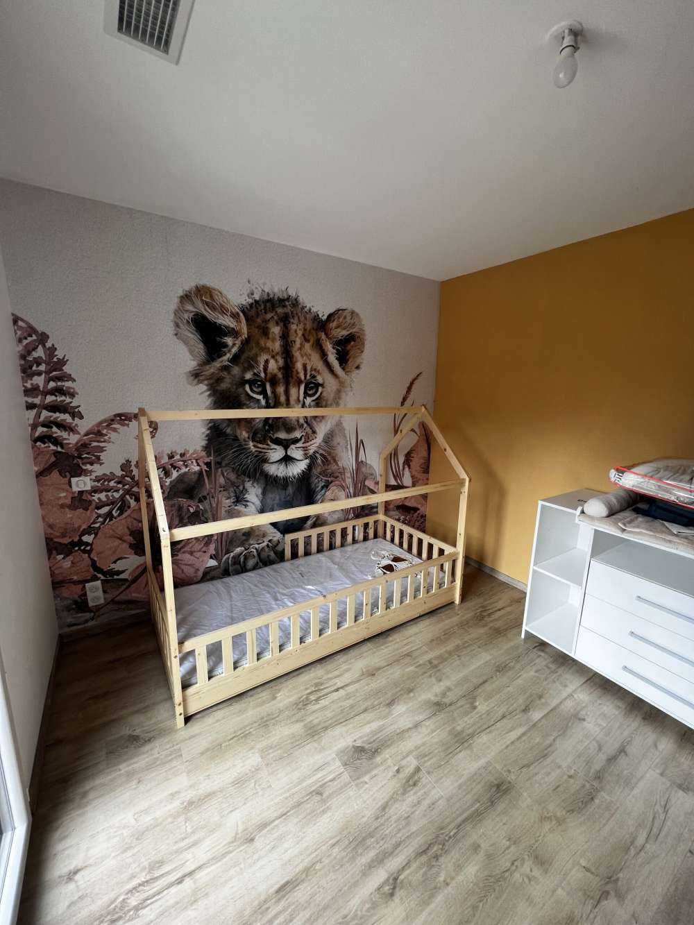 Baby lion in the jungle taupe