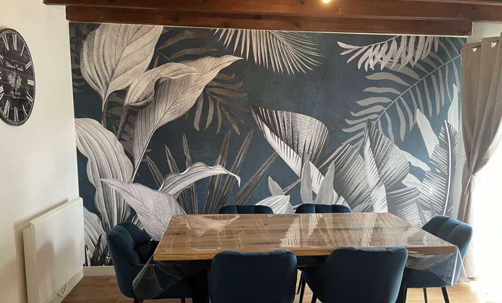 Tropical leaves on a blue background