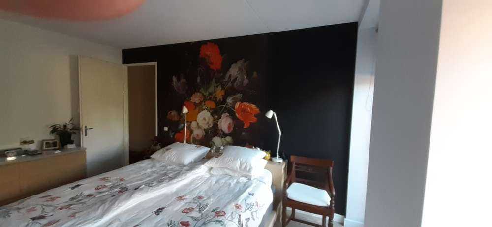 Still life with flowers and a watch