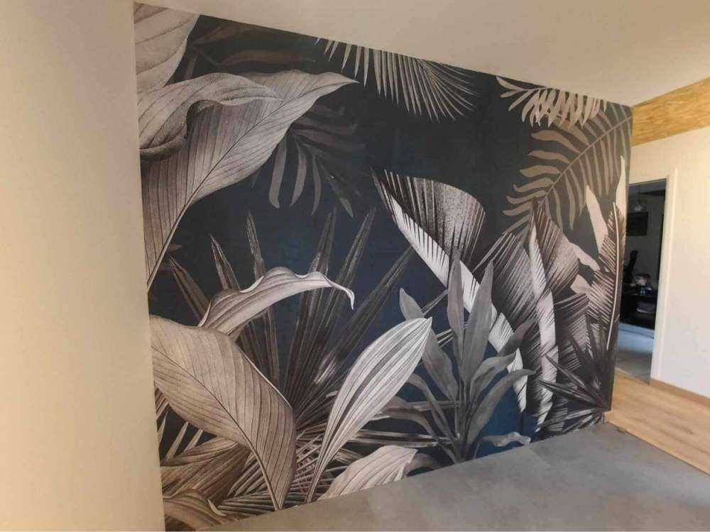 Tropical leaves on a blue background