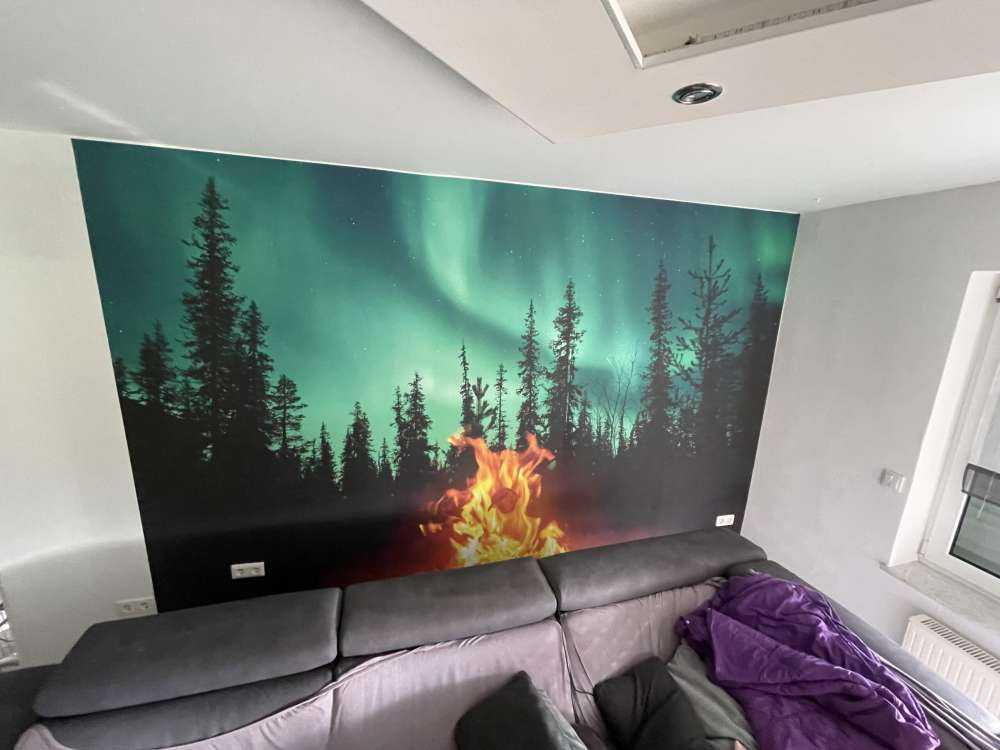 Campfire under the northern lights