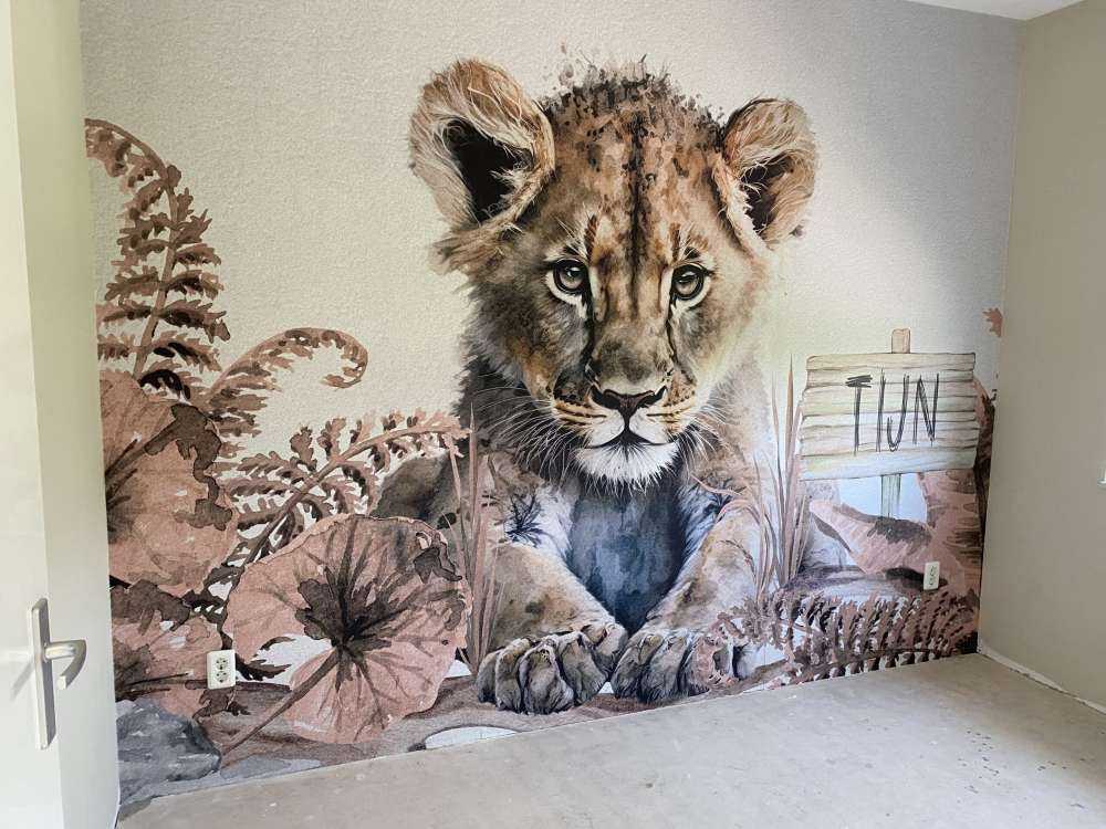 Baby lion in the jungle taupe