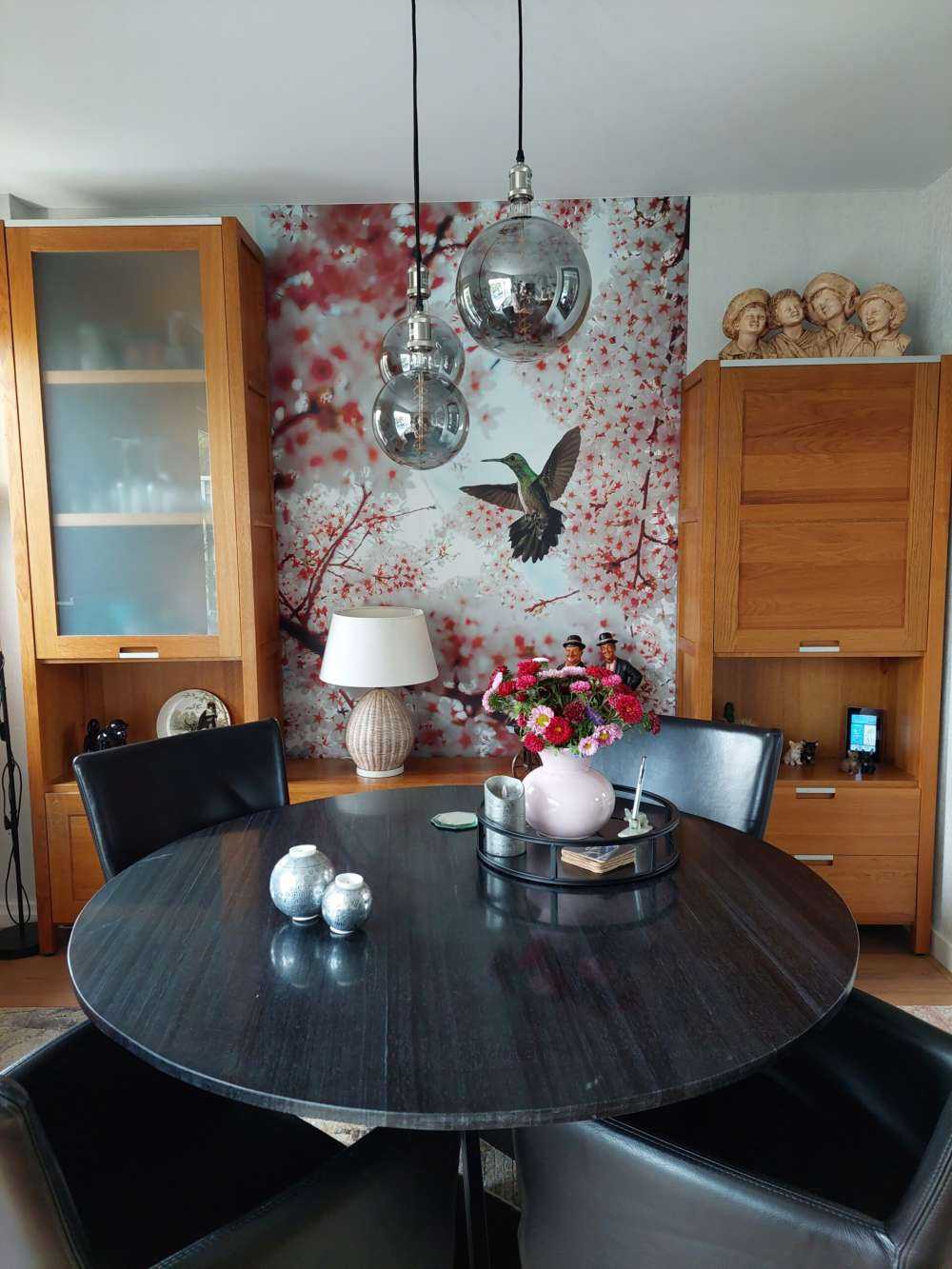 Hummingbird between the blossoms