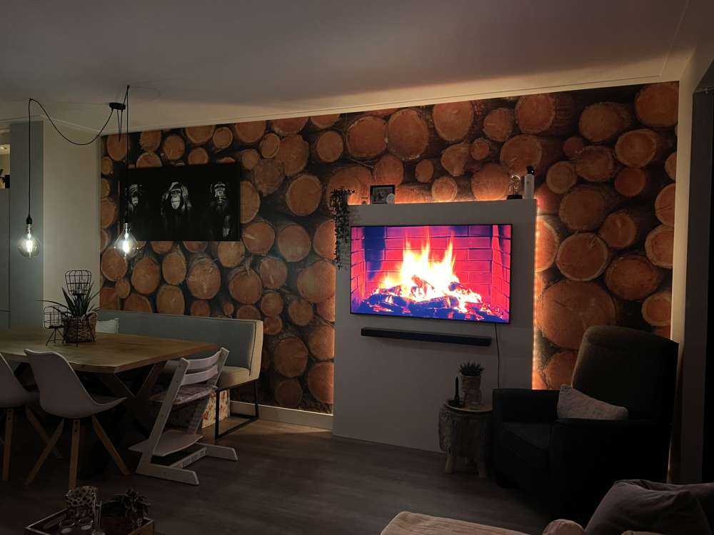 Pile of dark tree trunks