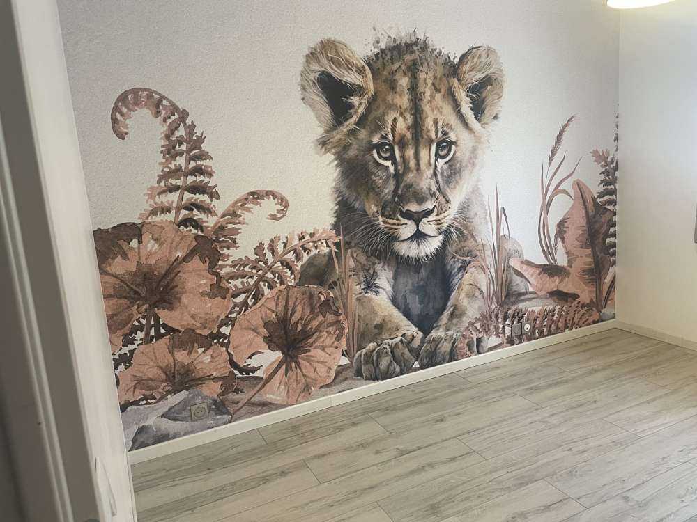 Baby lion in the jungle taupe