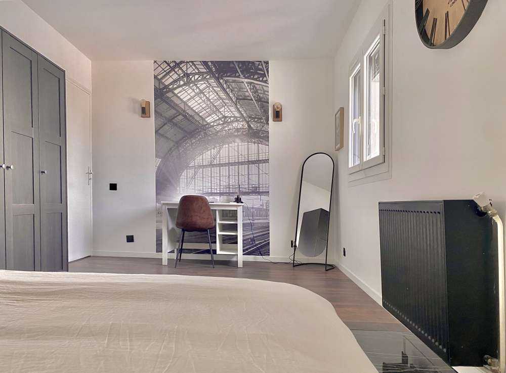 Sunrise on a station in black and white