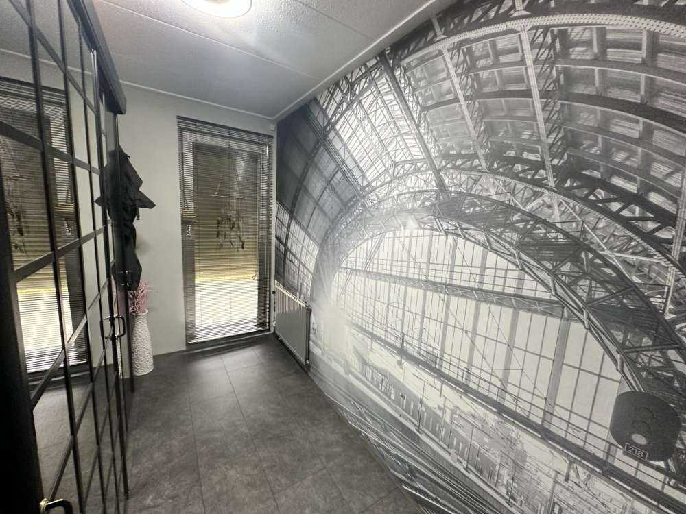 Sunrise on a station in black and white