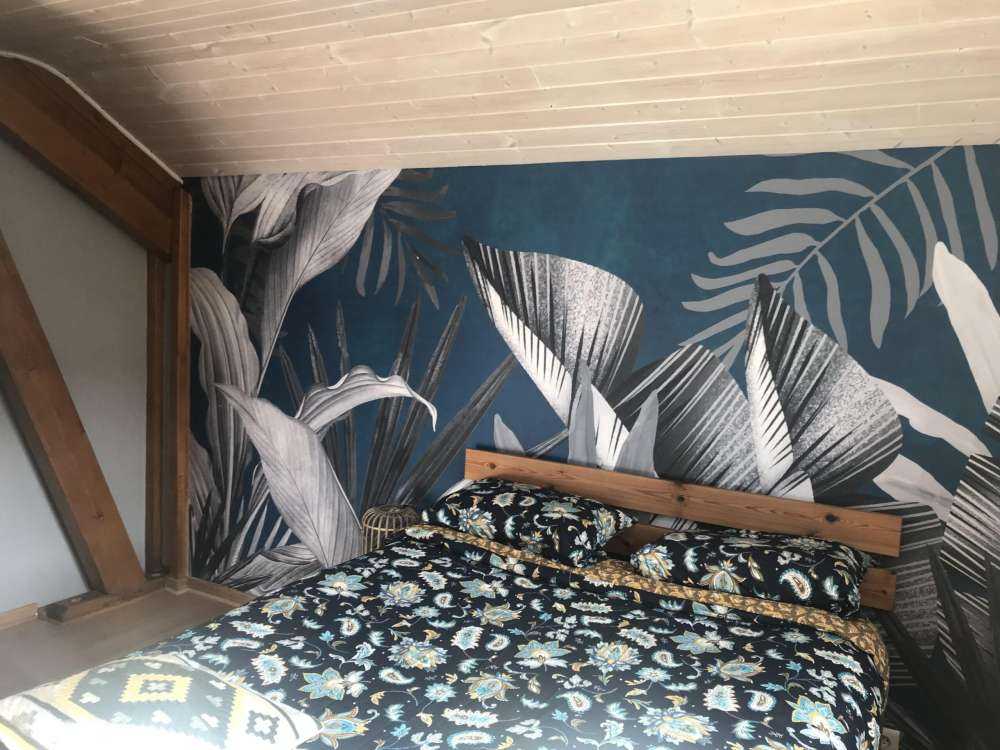 Tropical leaves on a blue background