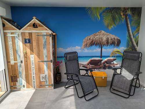Chairs and parasol on tropical beach