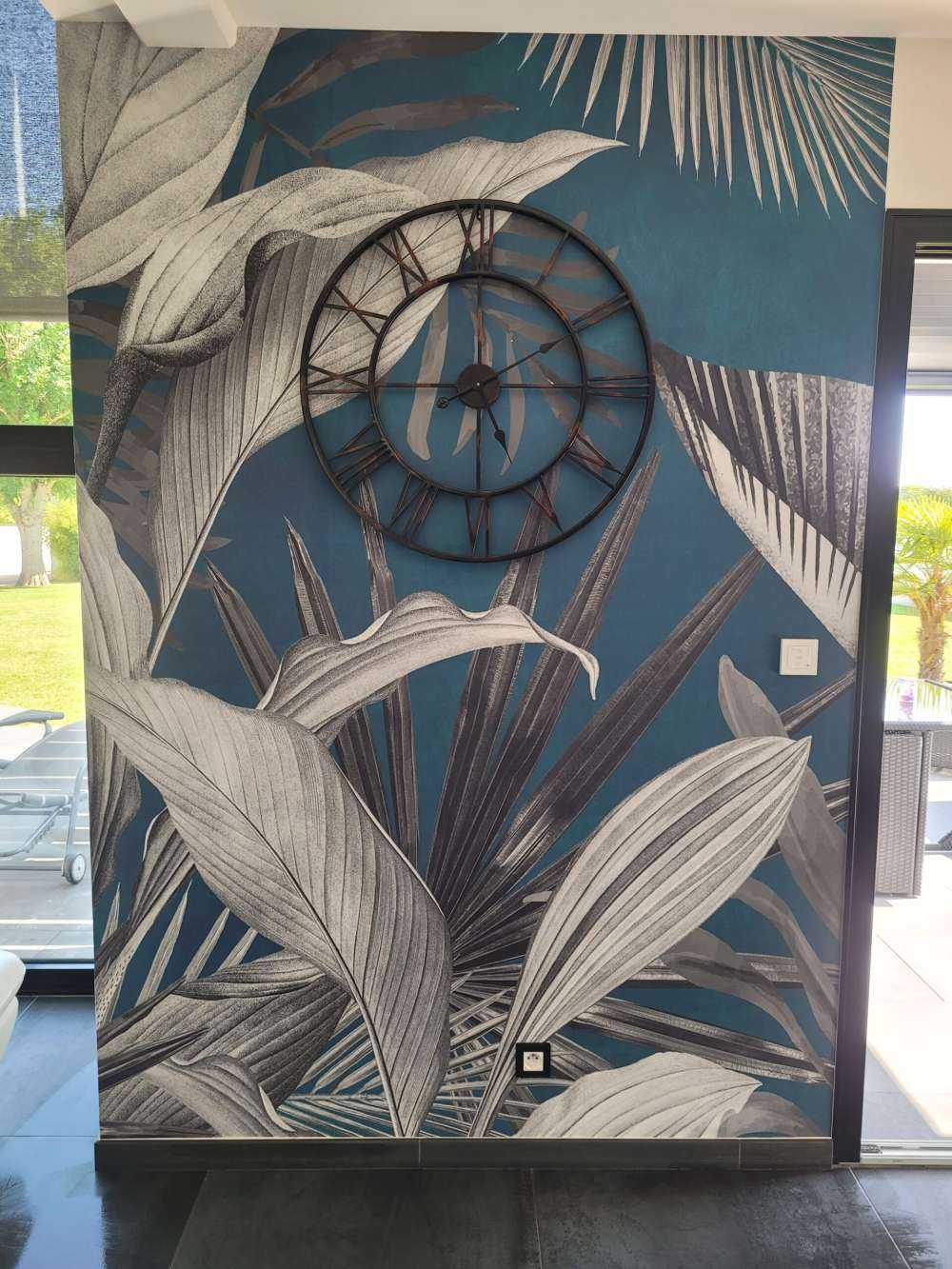 Tropical leaves on a blue background