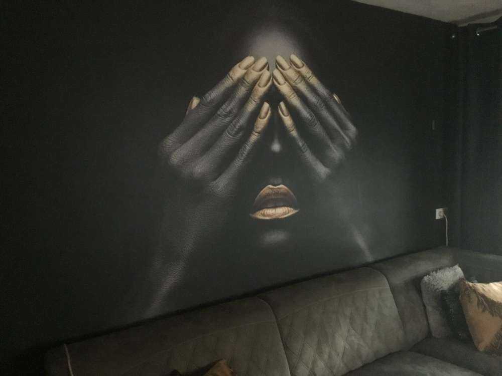 Woman with hands in front of her eyes