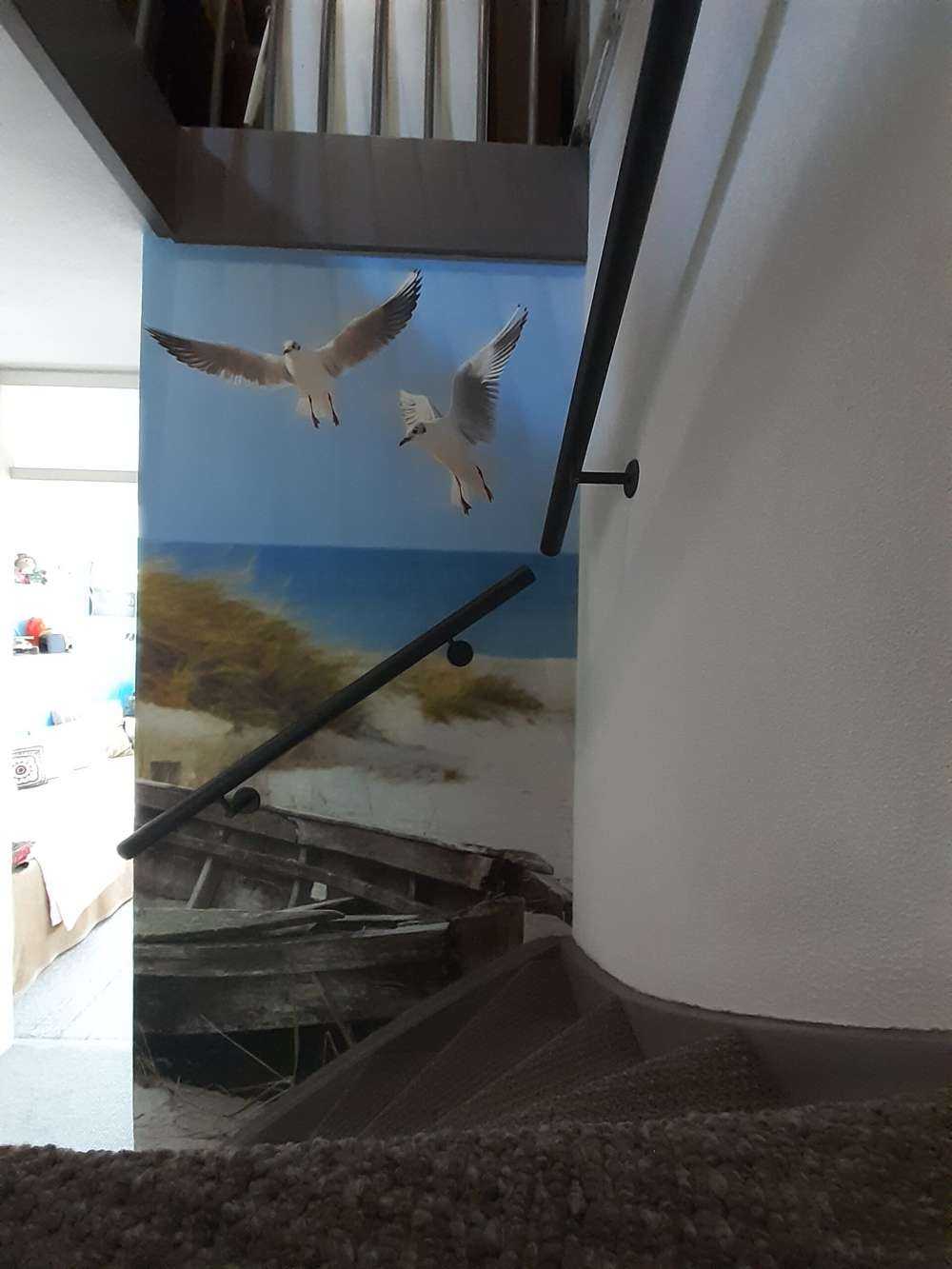 Old fishing boat, seagulls, beach and sea