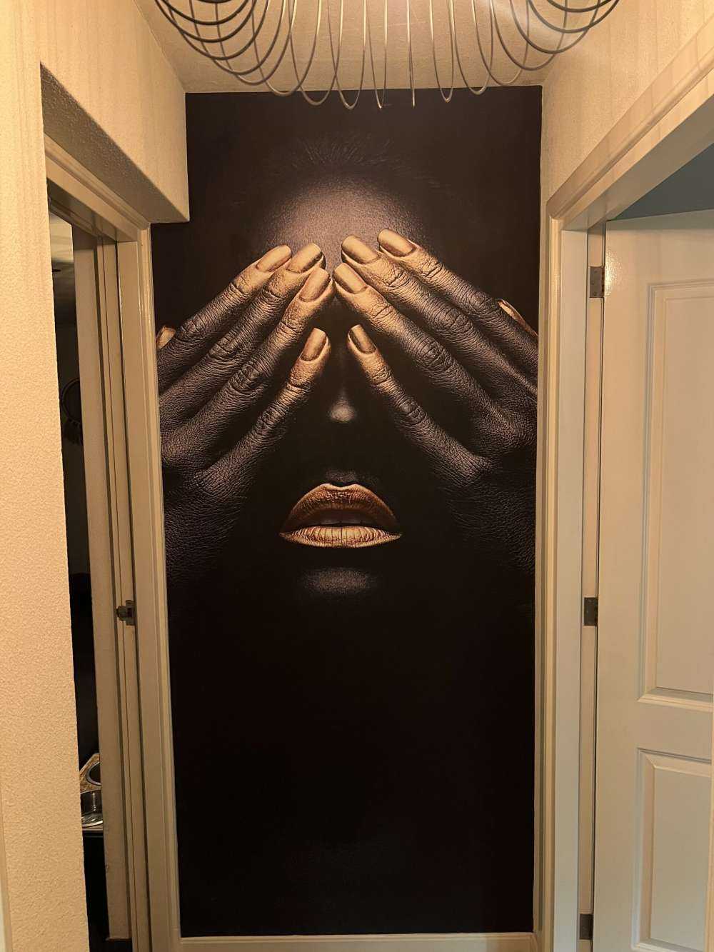 Woman with hands in front of her eyes