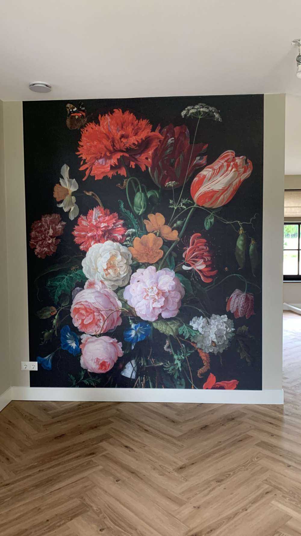 Still life with flowers in a glass vase
