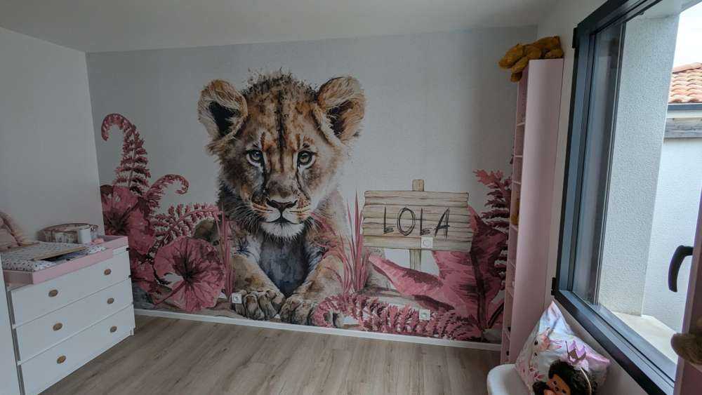 Young lion in the jungle pink