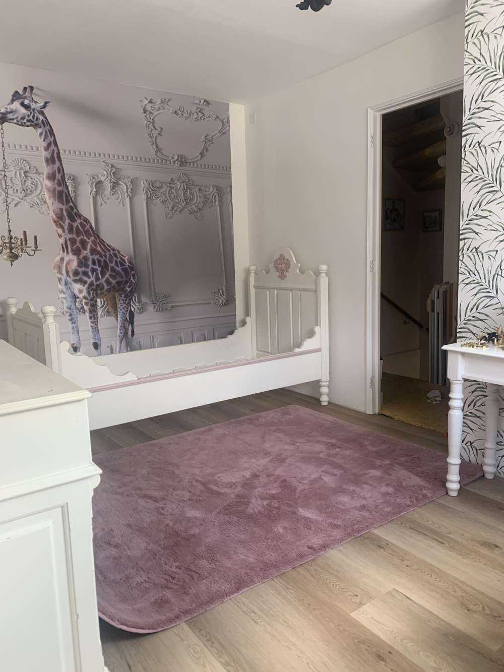 Giraffe with candlestick