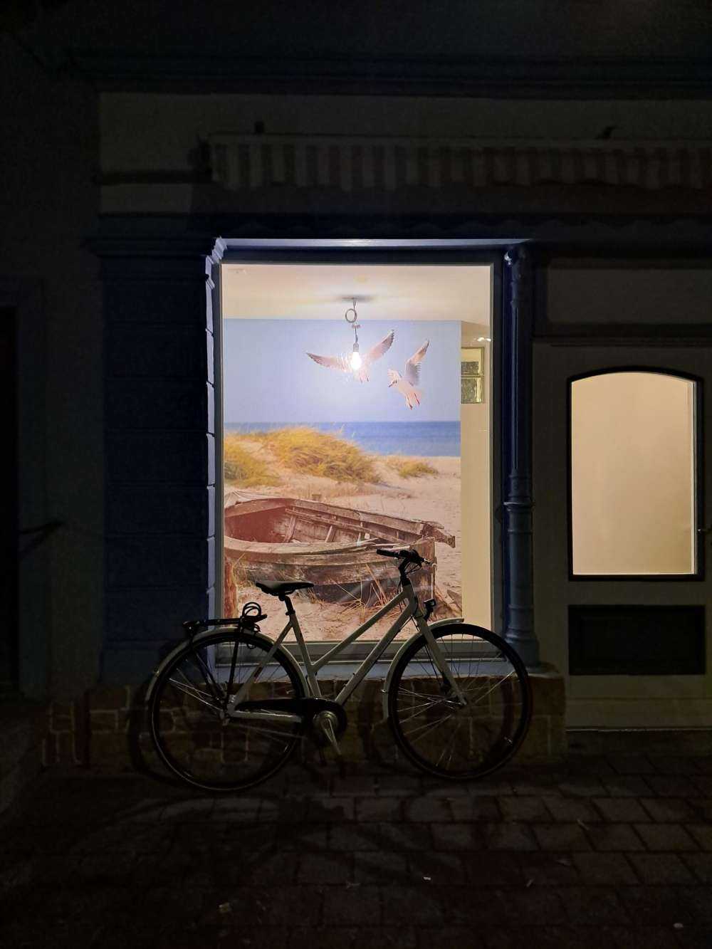 Old fishing boat, seagulls, beach and sea