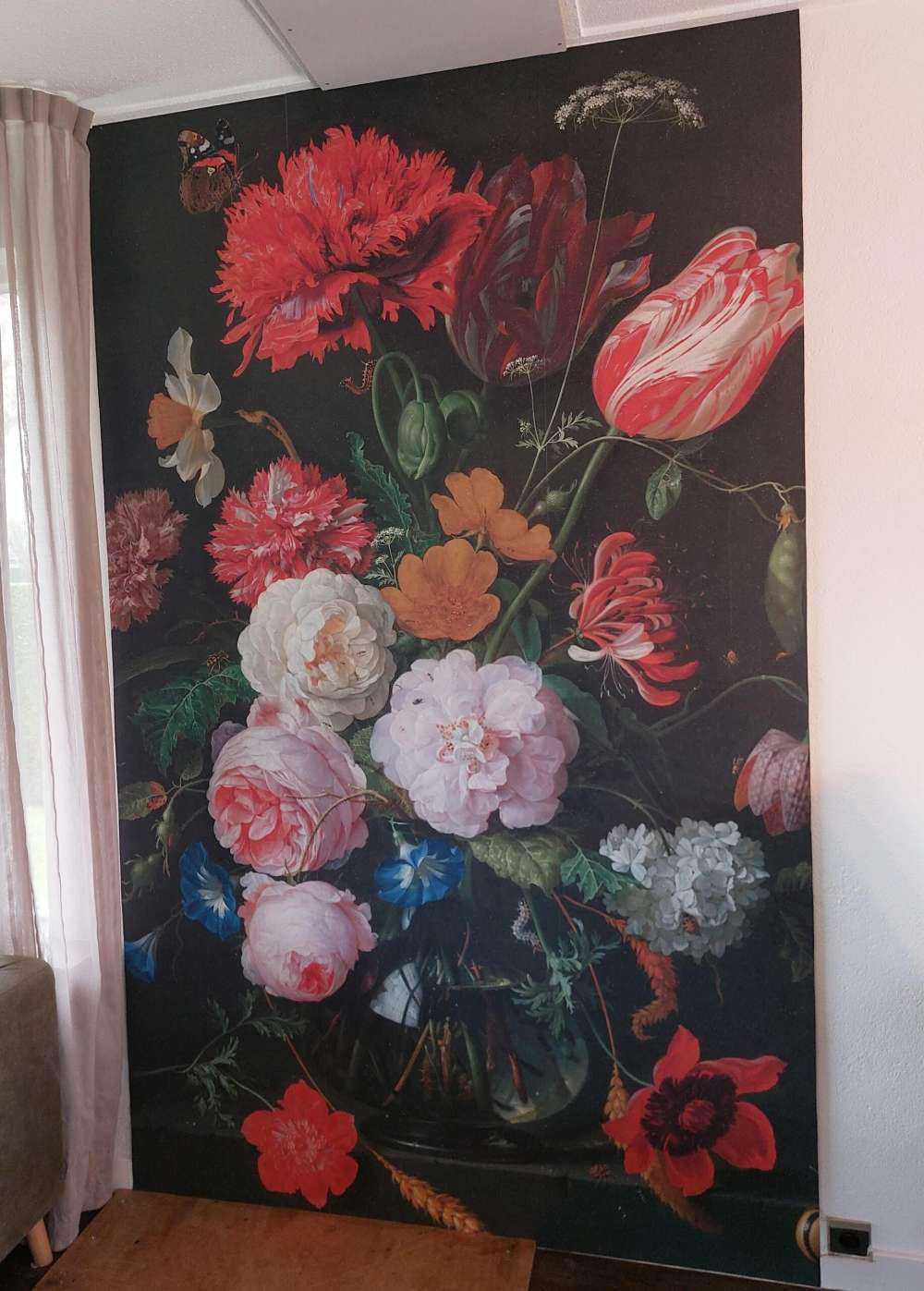 Still life with flowers in a glass vase