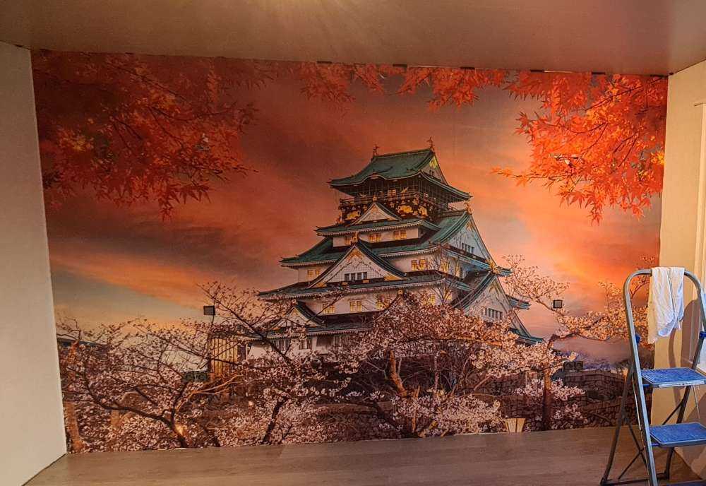 Osaka castle through the trees