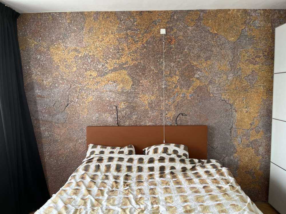 Old wall with yellow stucco