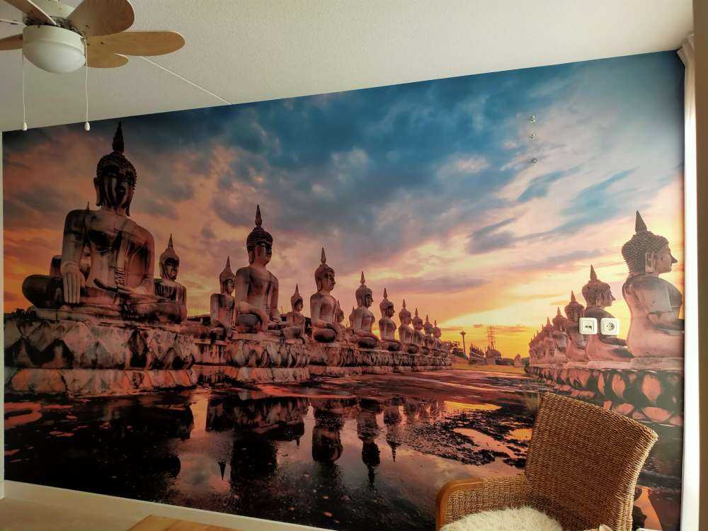 Buddha statues on water