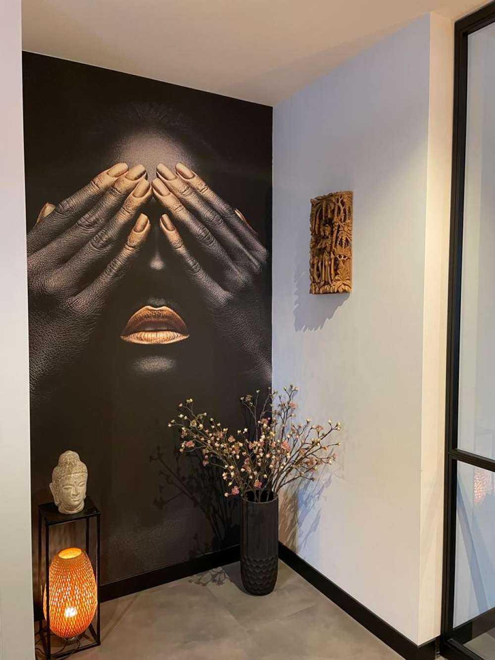 Woman with hands in front of her eyes