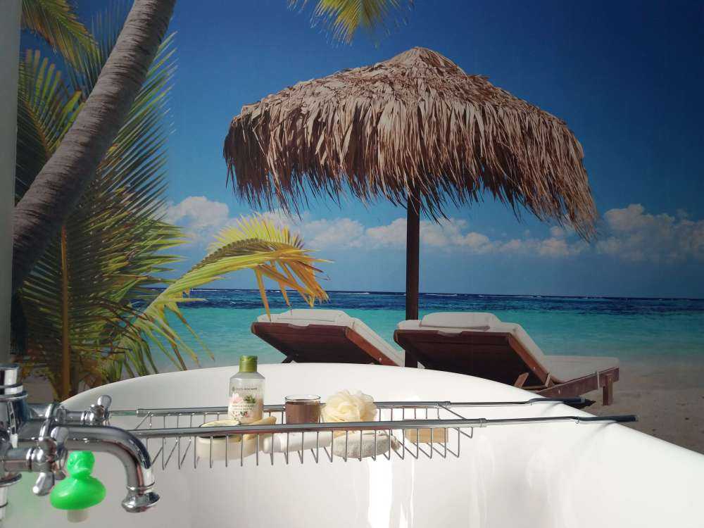 Chairs and parasol on tropical beach