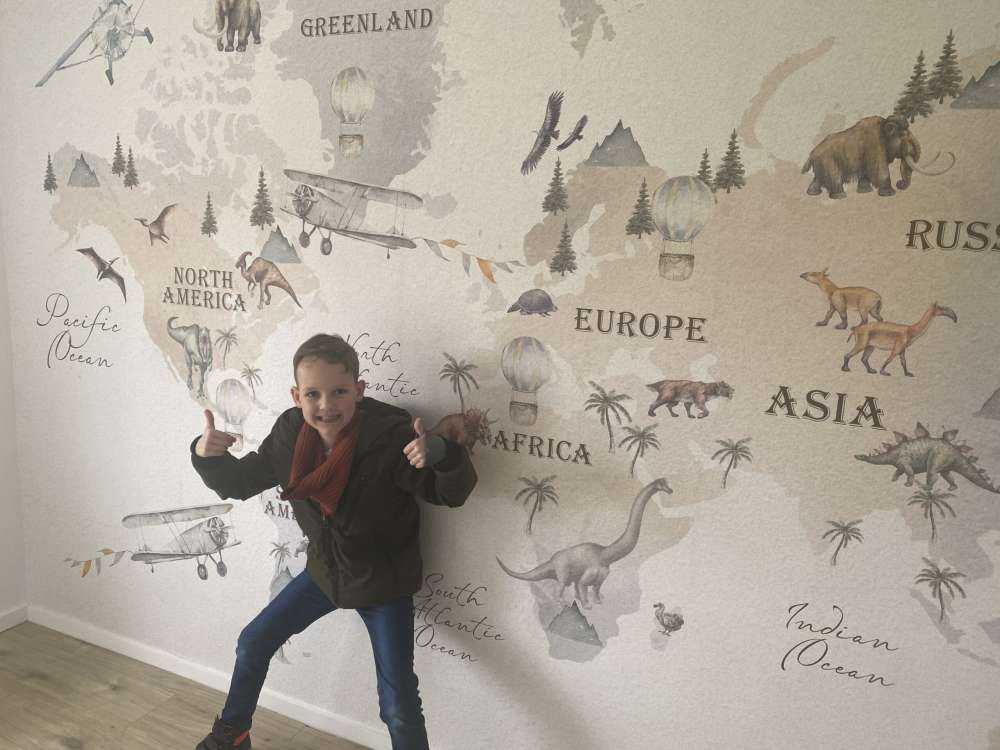 World map with dinosaurs