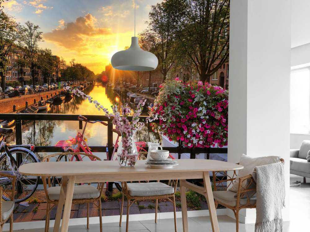 Cycling on a bridge with flowers