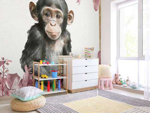 Baby chimpanzee in the jungle pink
