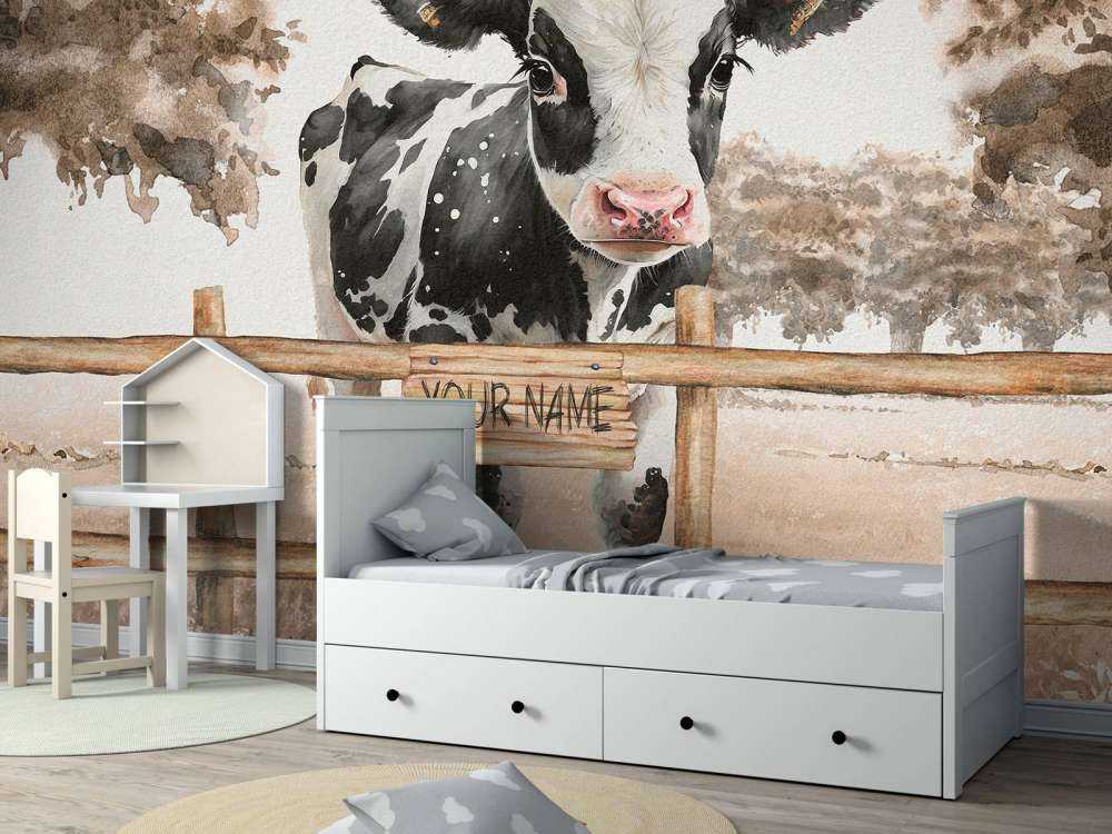 Young cow in a meadow taupe