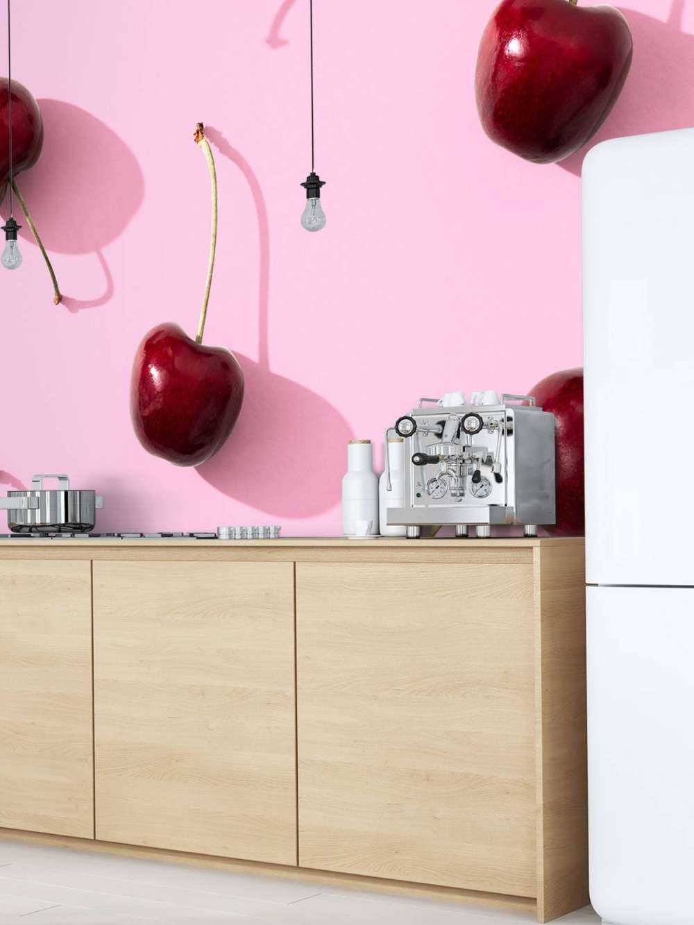 Cherries on pink background