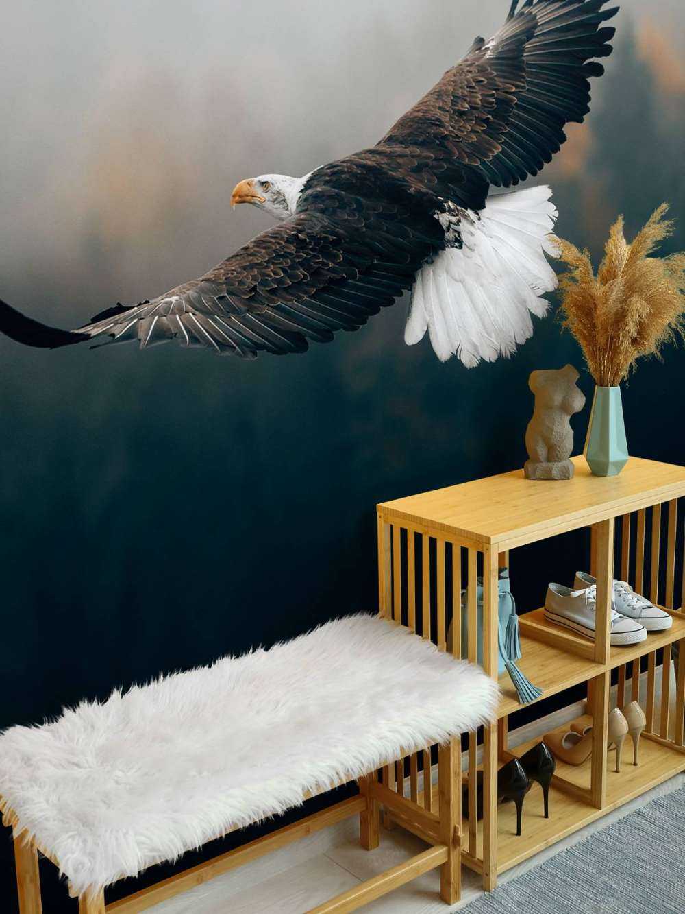 Bald eagle above the forest