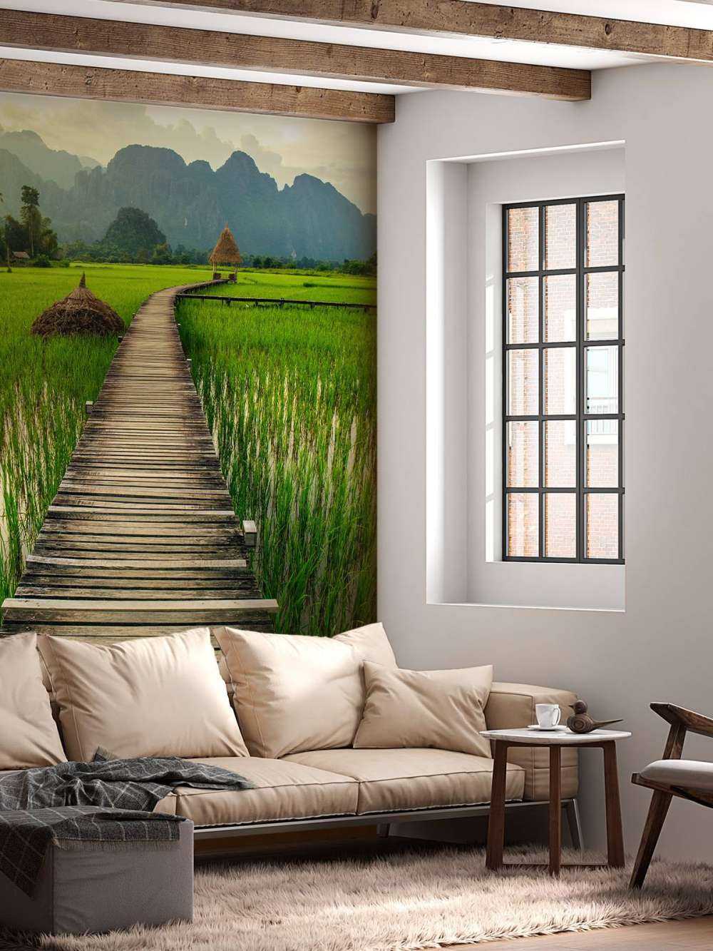 Wooden scaffolding through a rice field