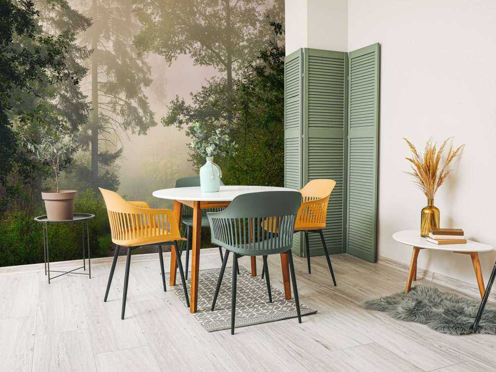 Road through foggy forest