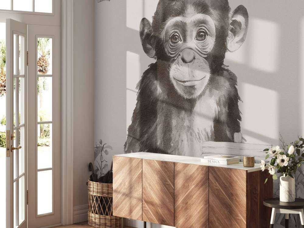 Baby chimpanzee in the jungle beige