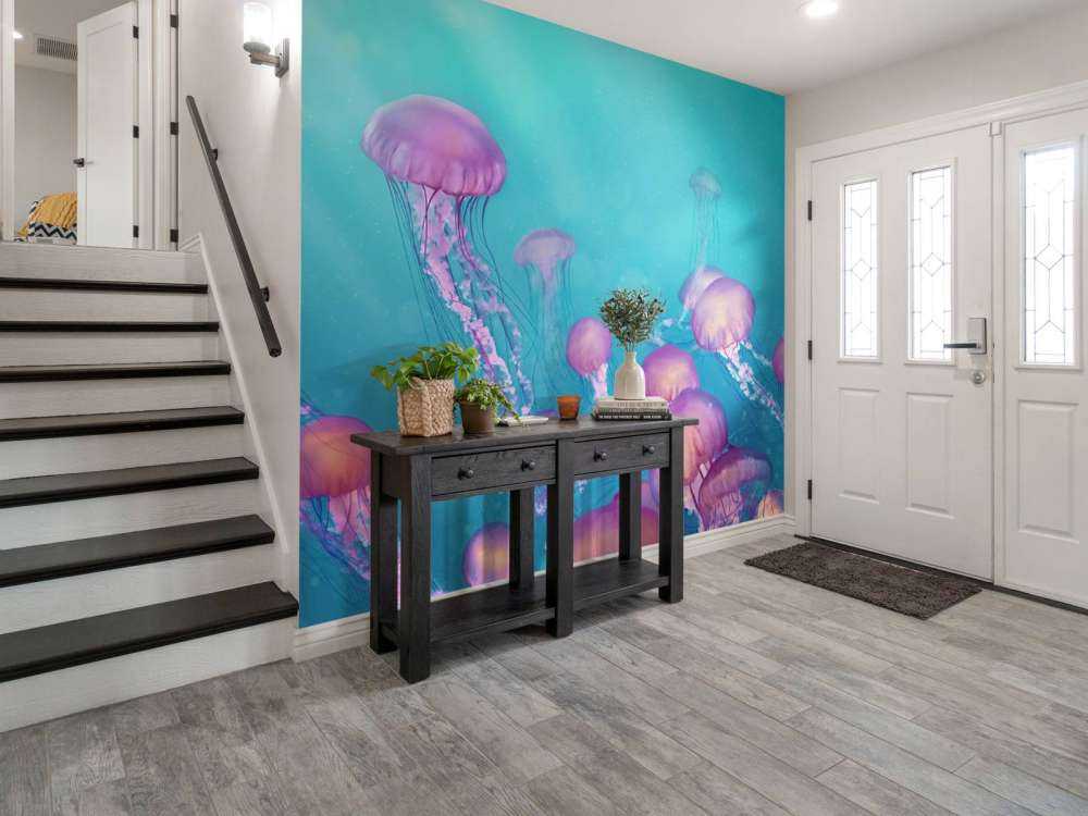 Pink jellyfish in blue sea