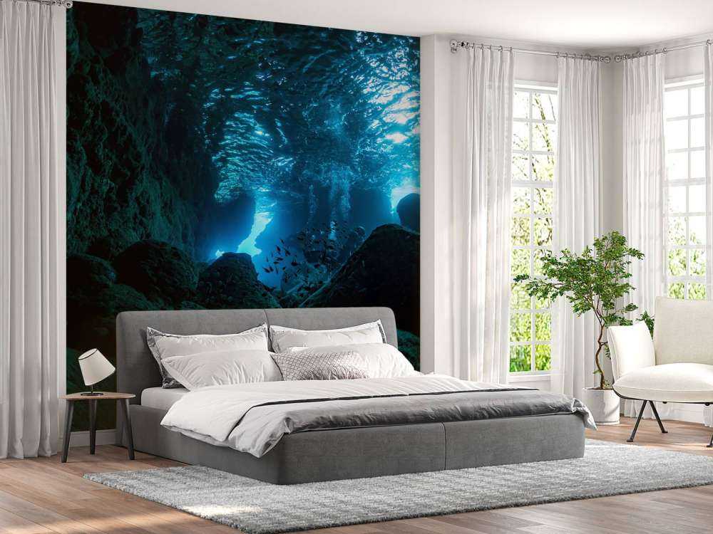 Sunbeams in underwater cave