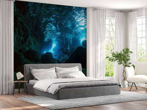 Sunbeams in underwater cave