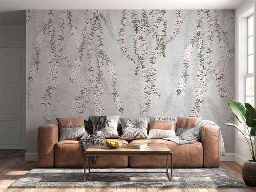 Flower branches on light blue concrete