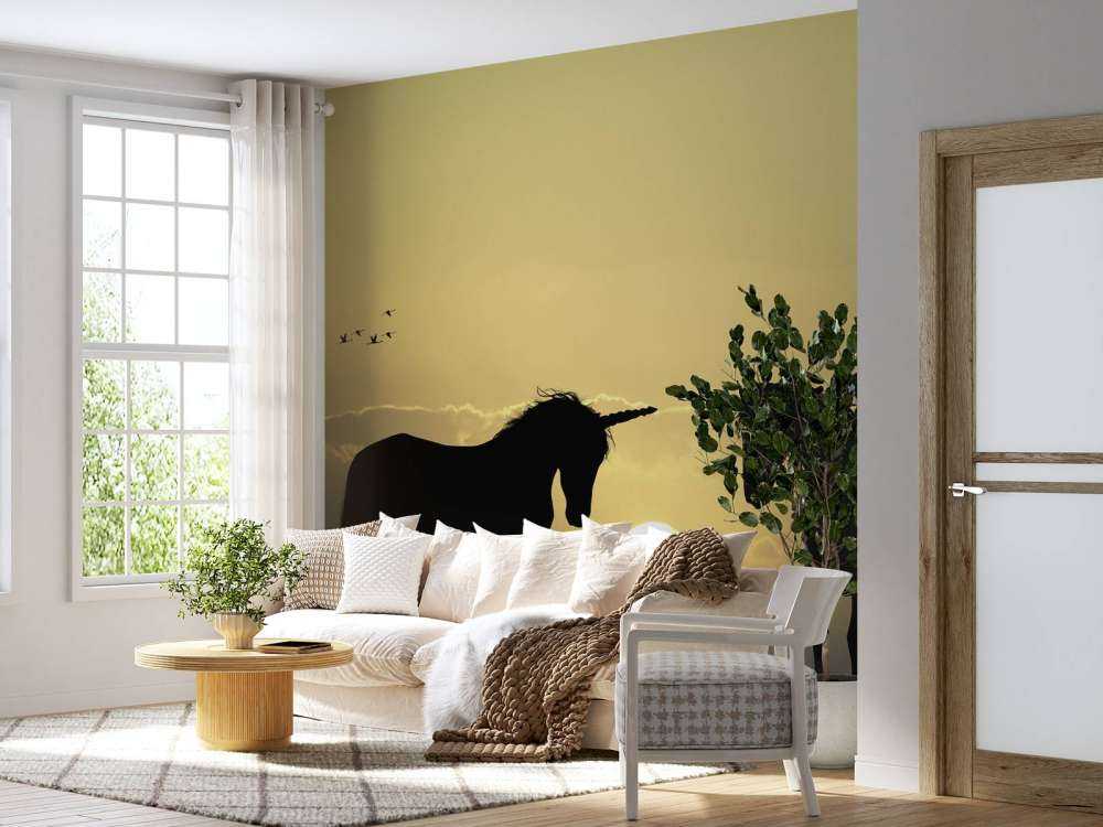 Unicorns bij een zonsondergang