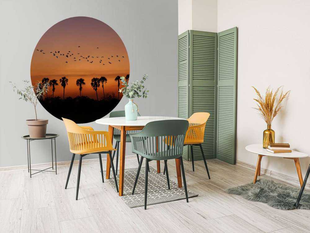 Palm trees with group of birds